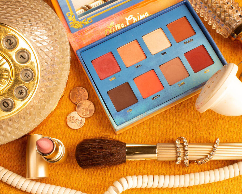 Cosmetics with bright orange background
