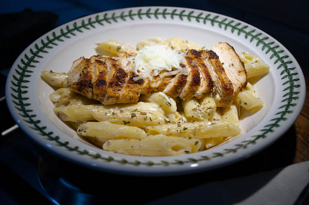 Chicken over pasta