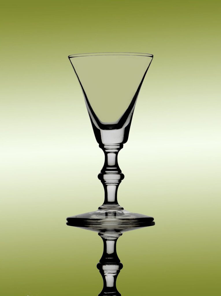 Glass with green background